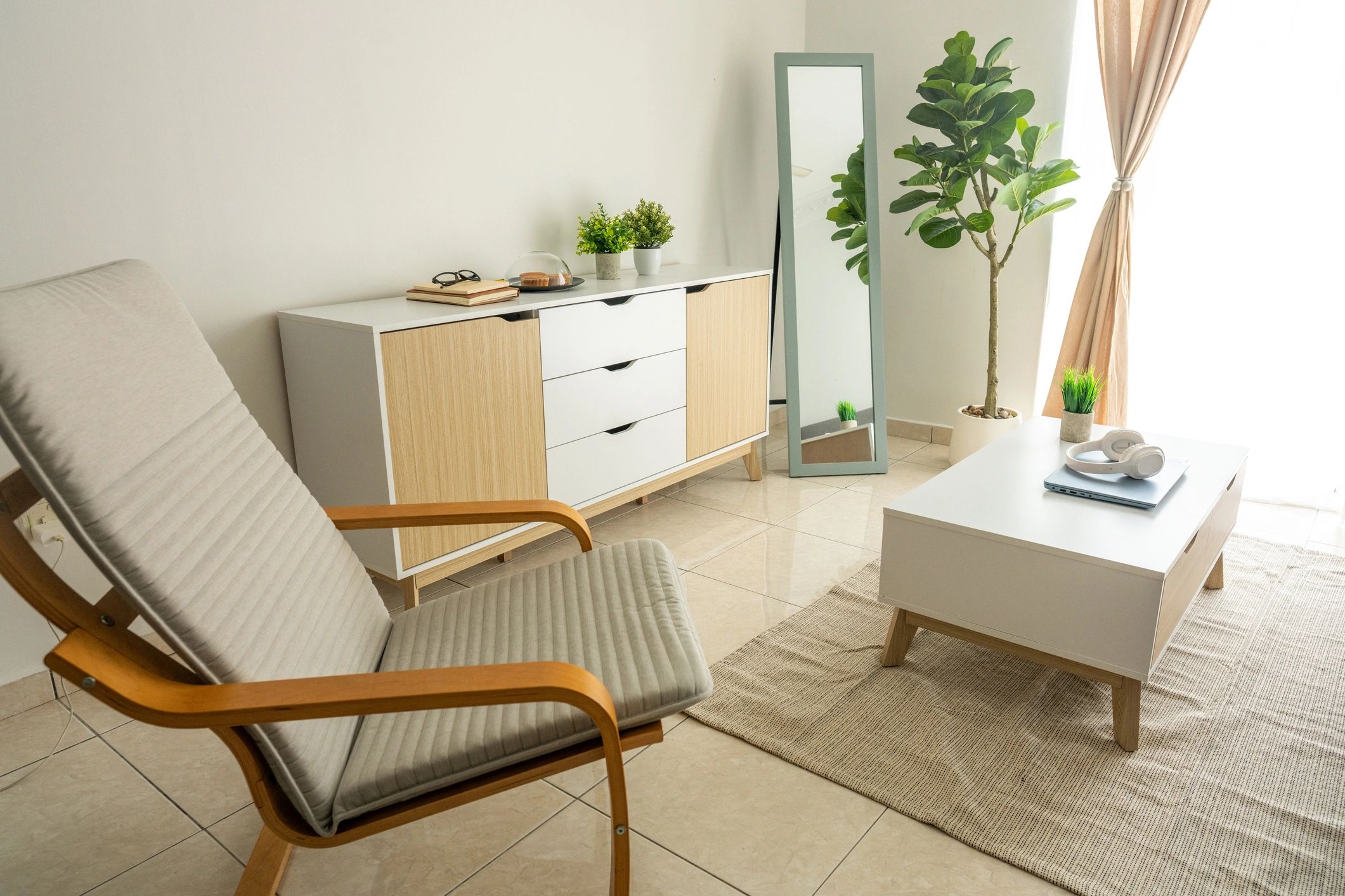 Tidy, modern living room staged for arriving guests